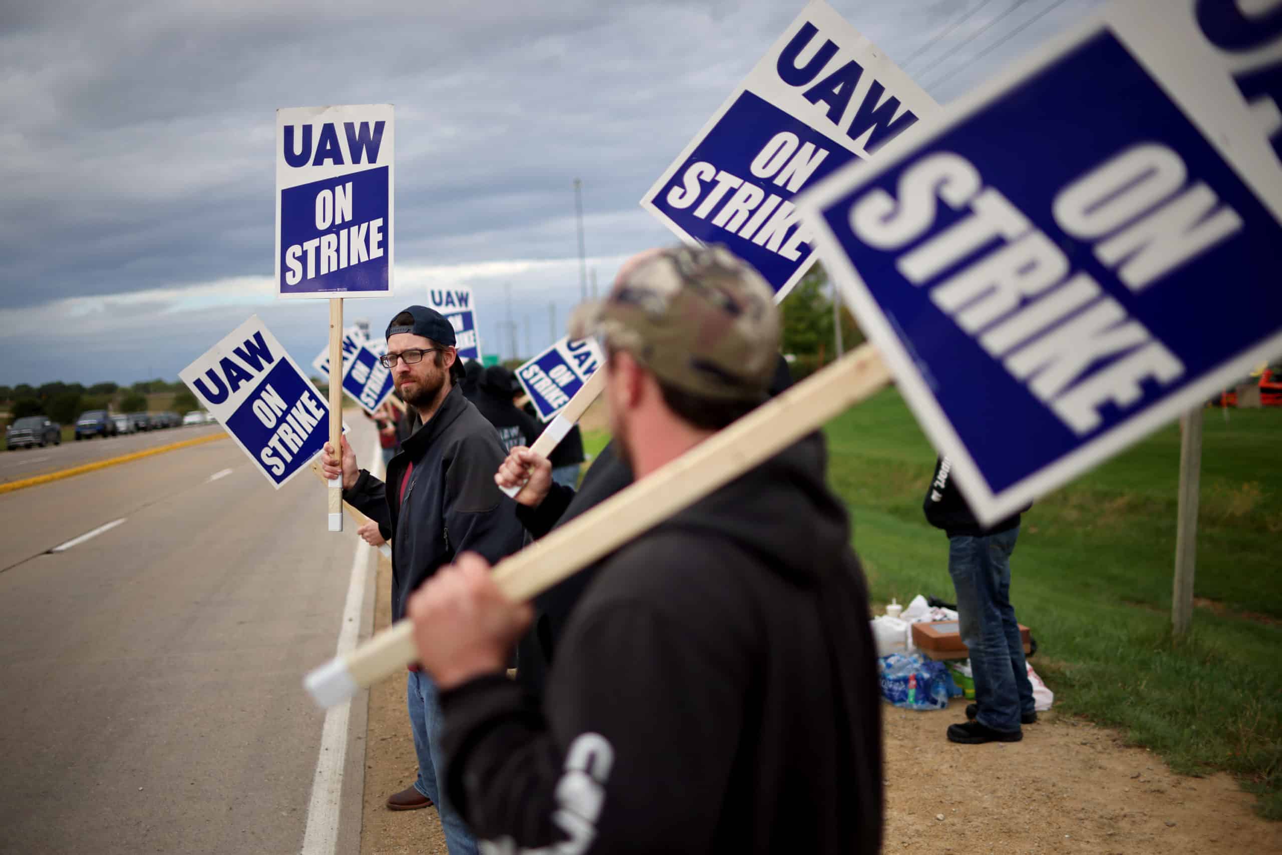 photo of john deere workers continuing to strike