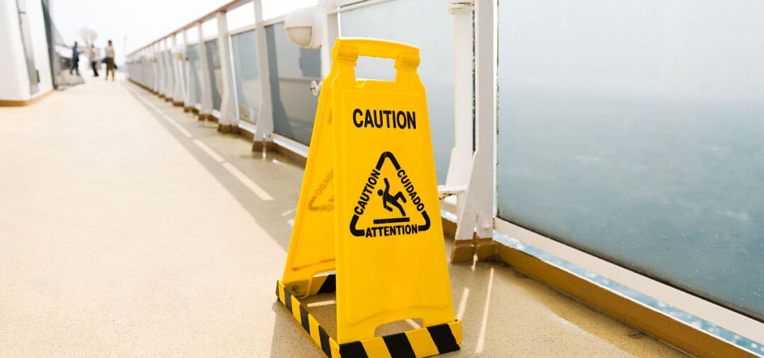 caution wet floor sign found on the deck of a cruise ship