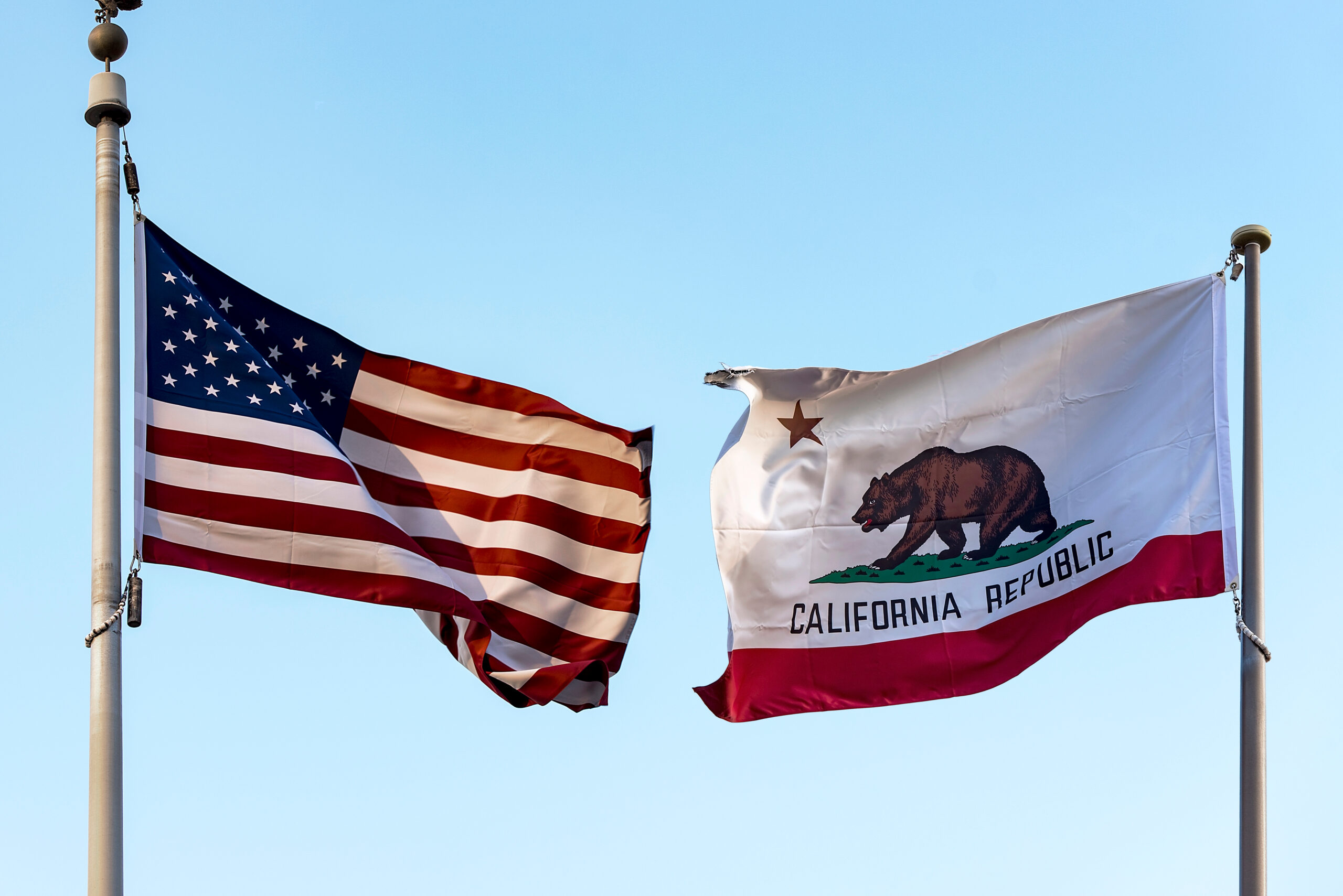 California and U.S. government flags. 