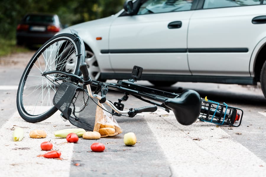 Bicycle accident, fruit. dropped 