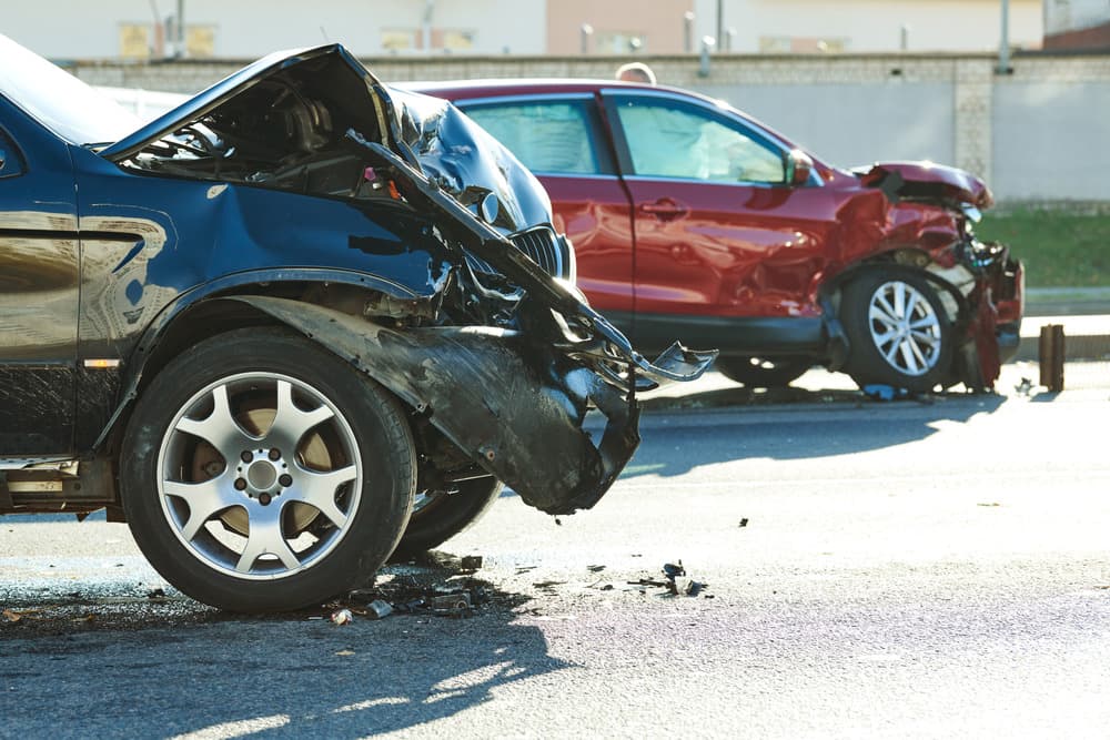 car crash accident on street. damaged automobiles