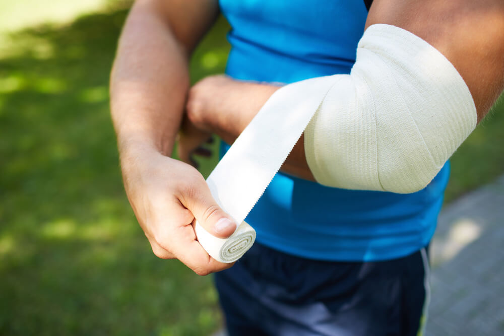 man with an injured arm