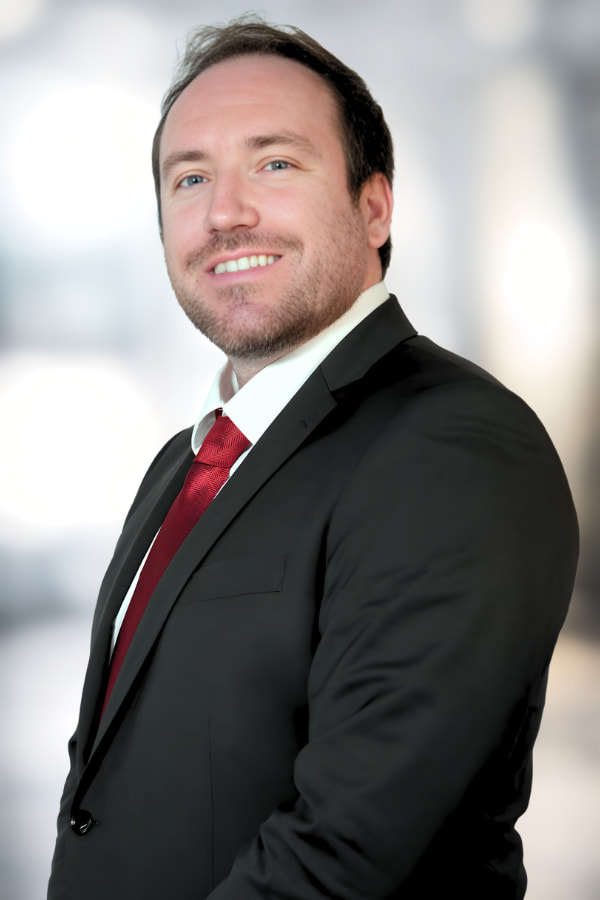 Tanner Hosfield, Esq.